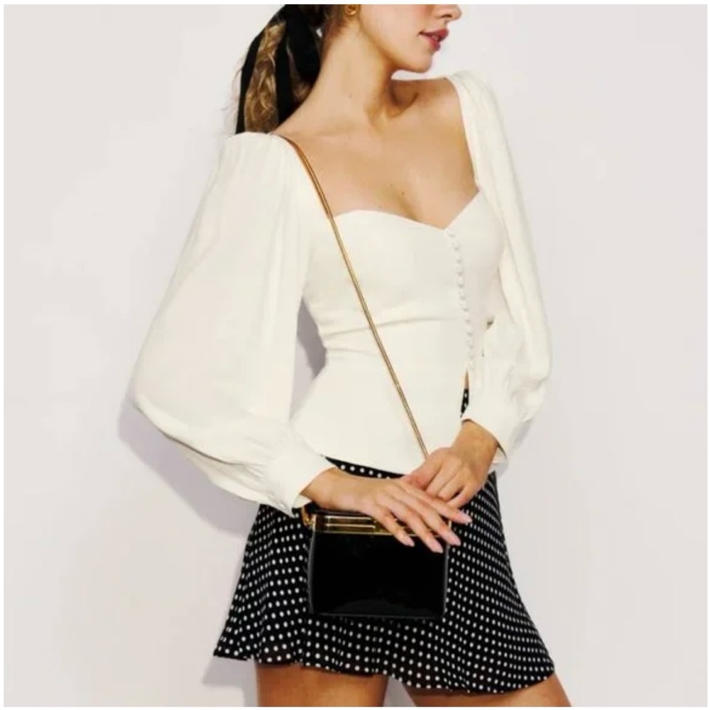 Elegant White Puff Sleeve Blouse from Reformation!